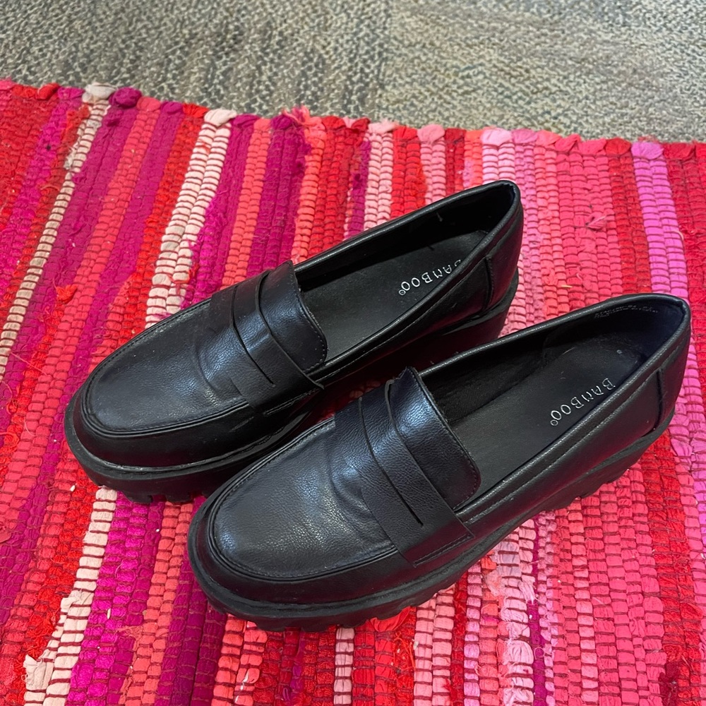 Black platform loafers